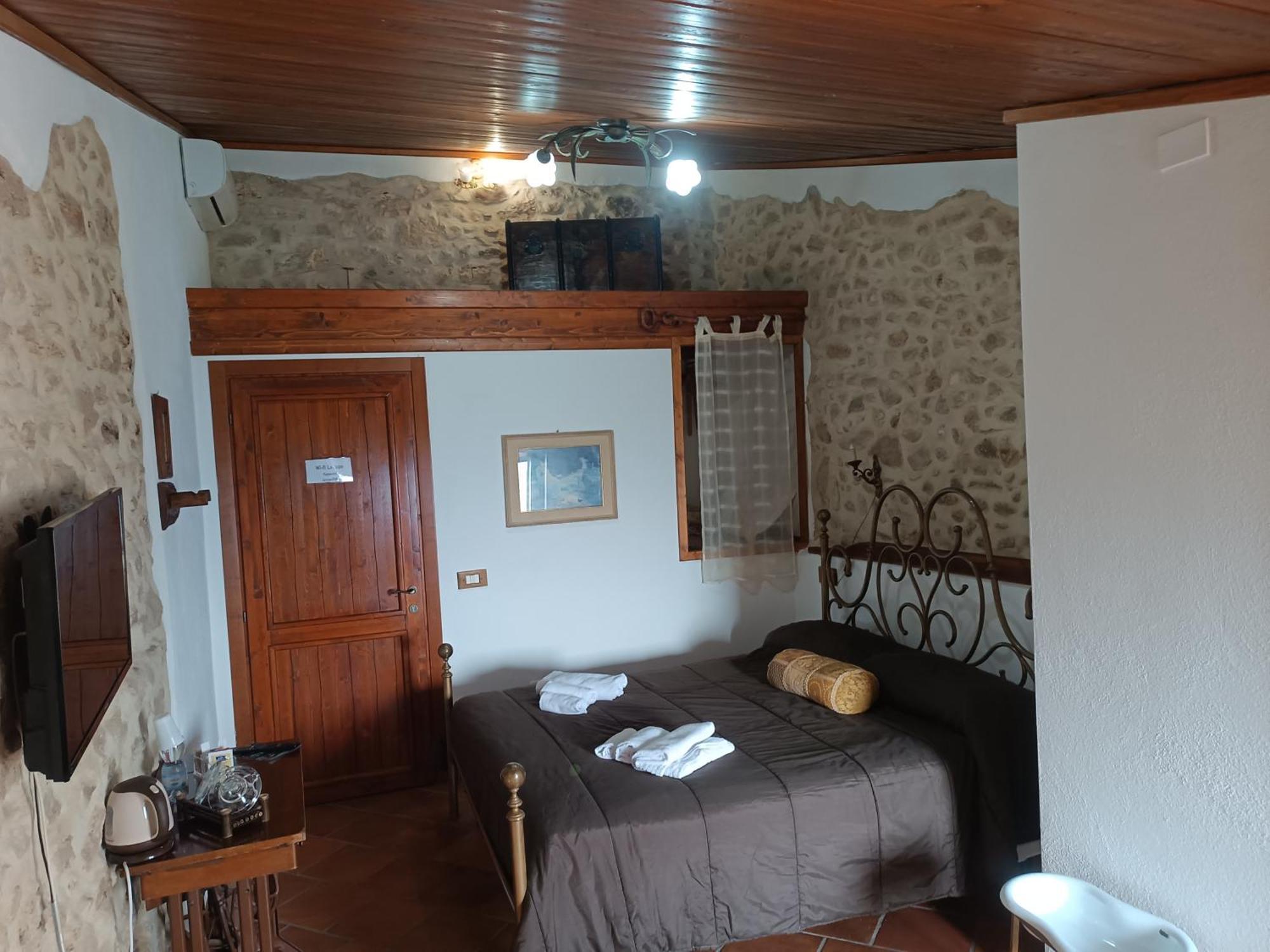 La Rupe Bed And Breakfast Norma Rum bild