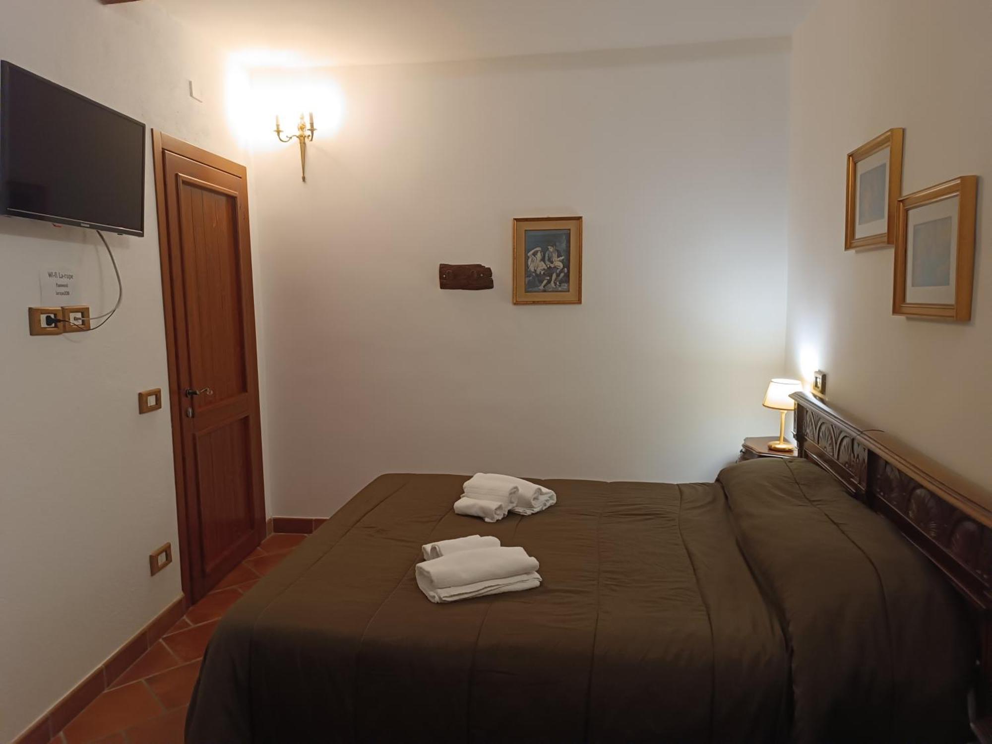 La Rupe Bed And Breakfast Norma Rum bild